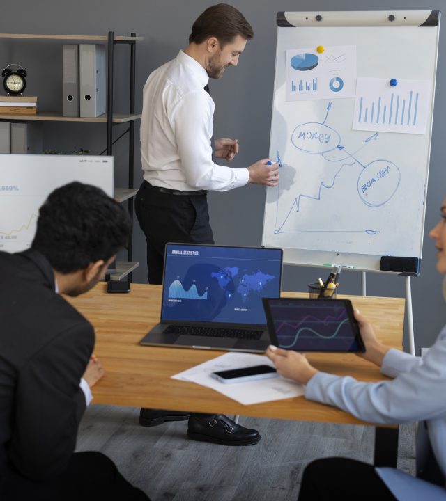 business-person-looking-finance-graphs business-person-looking-finance-graphs